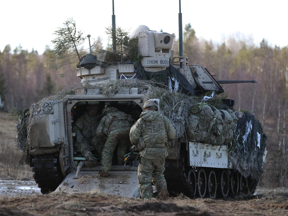 U.S. soldiers take part in a joint military combat exercise with Estonian soldiers in 2017 near Tapa, Estonia. The U.S. is readying 8,500 troops to possibly deploy to Eastern Europe.