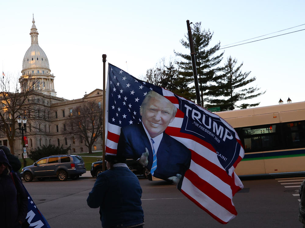 Supporters of then-President Donald Trump gather outside the Michigan State Capitol in 2020.