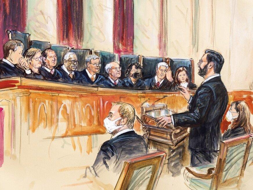 This artist sketch depicts Marc Hearron, petitioner for Whole Woman's Health, standing while speaking to the Supreme Court, Monday, Nov. 1, 2021, in Washington.