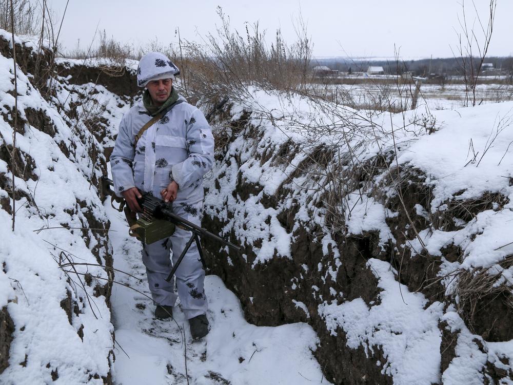 A soldier pauses in territory controlled by pro-Russian militants in eastern Ukraine. The U.S. and its allies are preparing responses and counter-responses if Russia invades Ukraine.