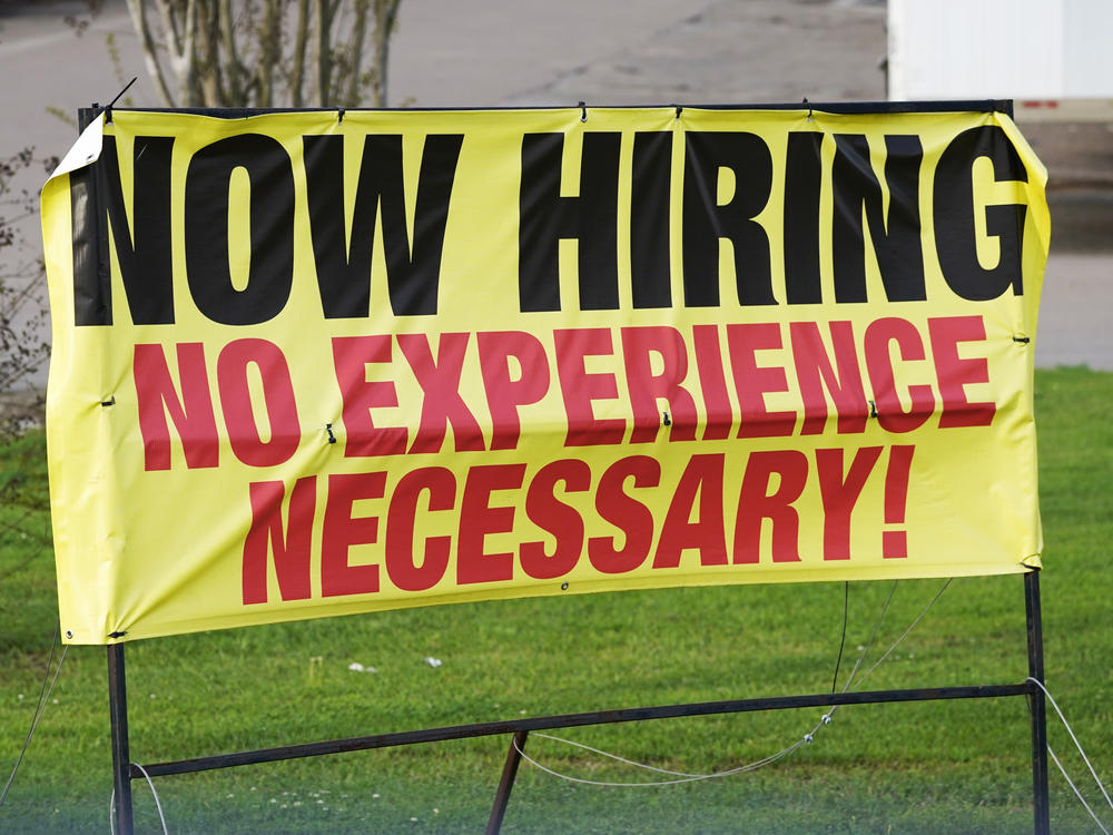 Help wanted signs such as this one outside a retailer in Hattiesburg, Miss., on March 27, 2021, were a common sight last year as busineses struggled to recruit workers.