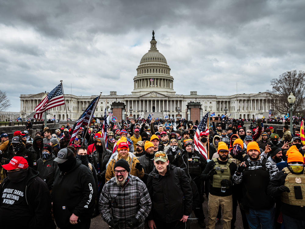 Pro-Trump protesters gather in front of the U.S. Capitol Building on January 6, 2021 in Washington, DC. A pro-Trump mob stormed the Capitol, breaking windows and clashing with police officers.