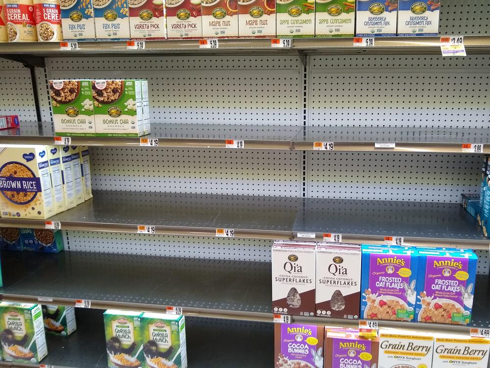 Shelves at a supermarket in Bethesda, Md., look empty on Jan. 13. Supply chain woes, the spike in the omicron variant of the coronavirus and bad weather have been key factors behind the empty shelves seen at many supermarkets across the United States.