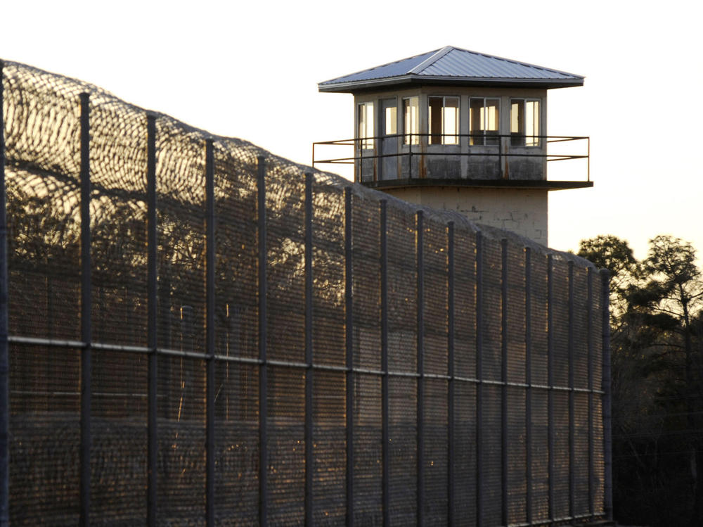 The sun sets behind Holman Prison in Atmore, Ala., on Thursday as the U.S. Supreme Court cleared the way for the execution of Matthew Reeves, convicted of killing a man during a robbery in 1996.