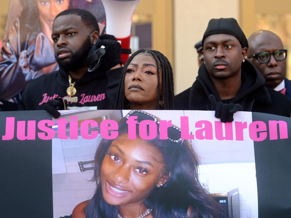 Shantell Fields, Lauren Smith-Fields' mother, stands with family members during a protest rally in front of the Morton Government Center, in Bridgeport, Conn. Jan. 23, 2022. Smith-Fields was found dead in her Bridgeport apartment in December and her family and friends marched in her memory on Sunday, which would have been her 24th birthday.