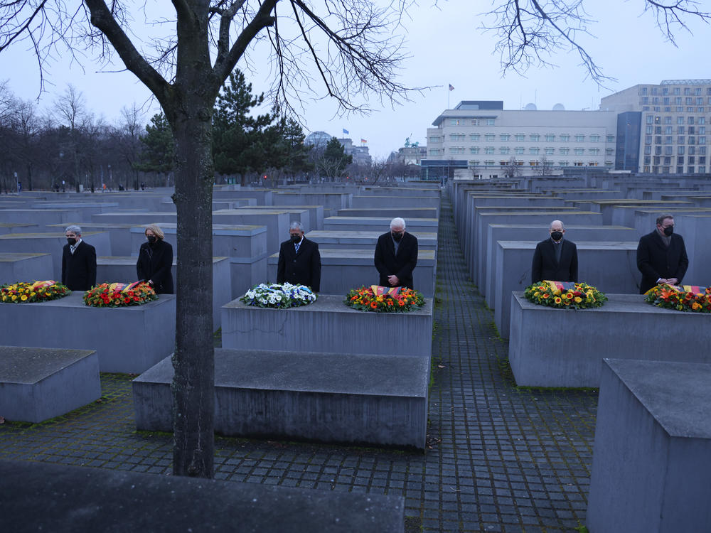 Public officials including Israeli Knesset President Mickey Levy, German President Frank-Walter Steinmeier and German Chancellor Olaf Scholz attend a wreath-laying ceremony on International Holocaust Remembrance Day at the Memorial to the Murdered Jews of Europe on Thursday in Berlin.