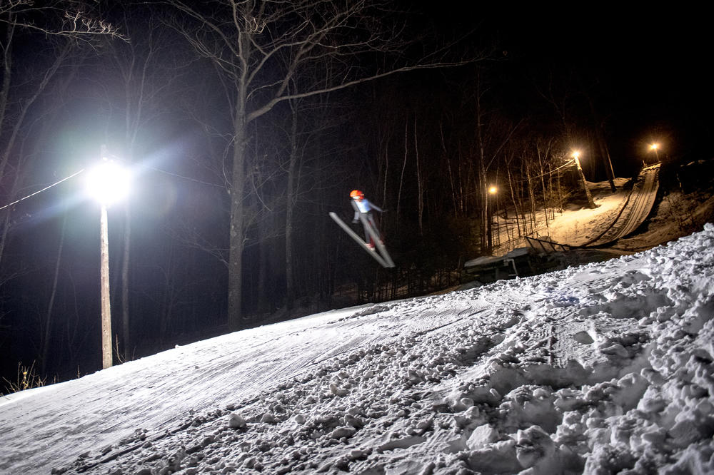 Isaac Larson, 13, jumps the 40-meter hill at the Suicide Hill Ski Bowl in Ishpeming, Mich. on March 4, 2021. Larson began ski jumping when he was 8-years-old alongside his two younger brothers, Max and Jacob.