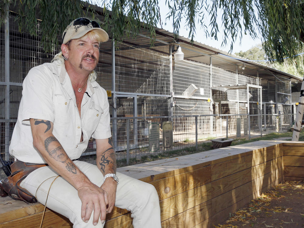 A judge in Oklahoma City took a year off the 22-year prison sentence of Joe Exotic, seen here in 2013, who was convicted in a murder-for-hire plot against his rival Carole Baskin.