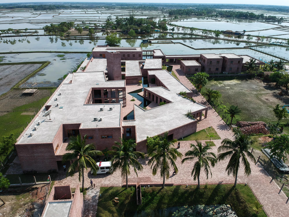 An aerial view of Friendship Hospital. The building's design was praised for staying in harmony with its waterlogged environment.