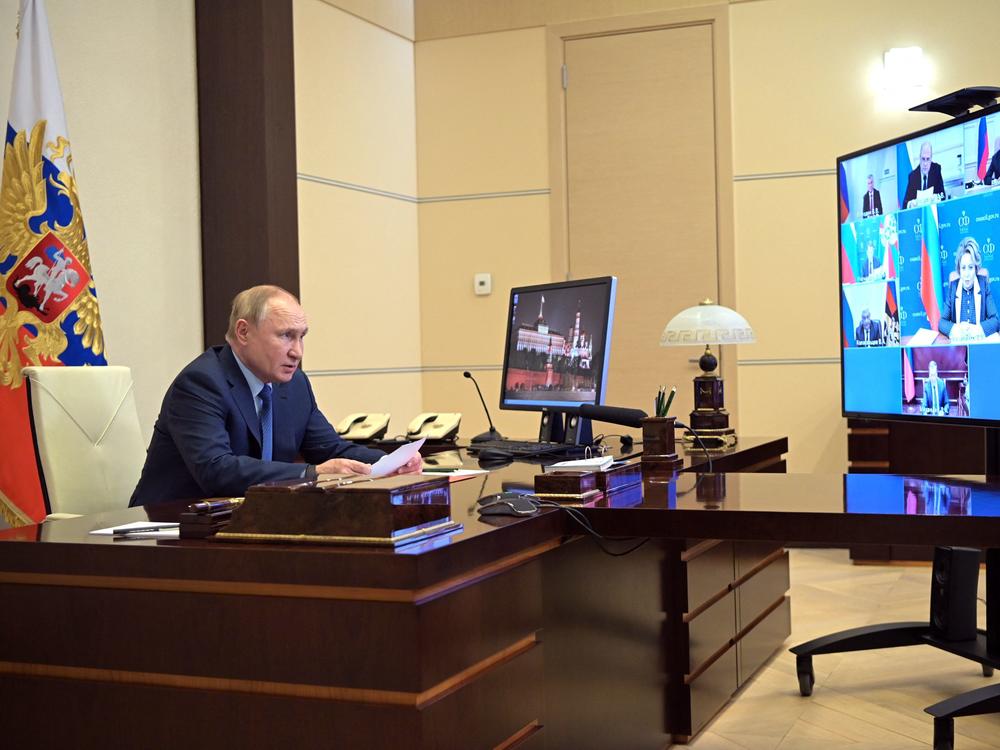 Russian President Vladimir Putin chairs a meeting with members of the U.N. Security Council via a videoconference at the Novo-Ogaryovo state residence outside Moscow on Friday.