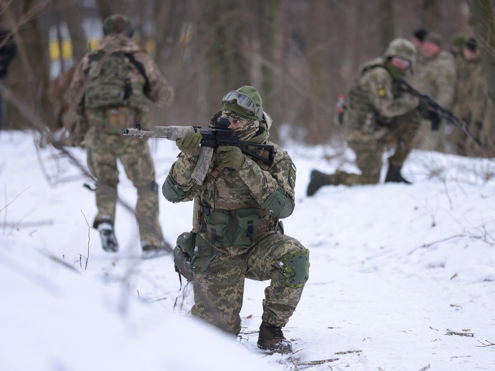 Civilian participants in a Kyiv Territorial Defense unit train on a Saturday in a forest on Jan. 22, 2022 in Kyiv, Ukraine. Across Ukraine thousands of civilians are participating in such groups to receive basic combat training and in time of war would be under direct command of the Ukrainian military.