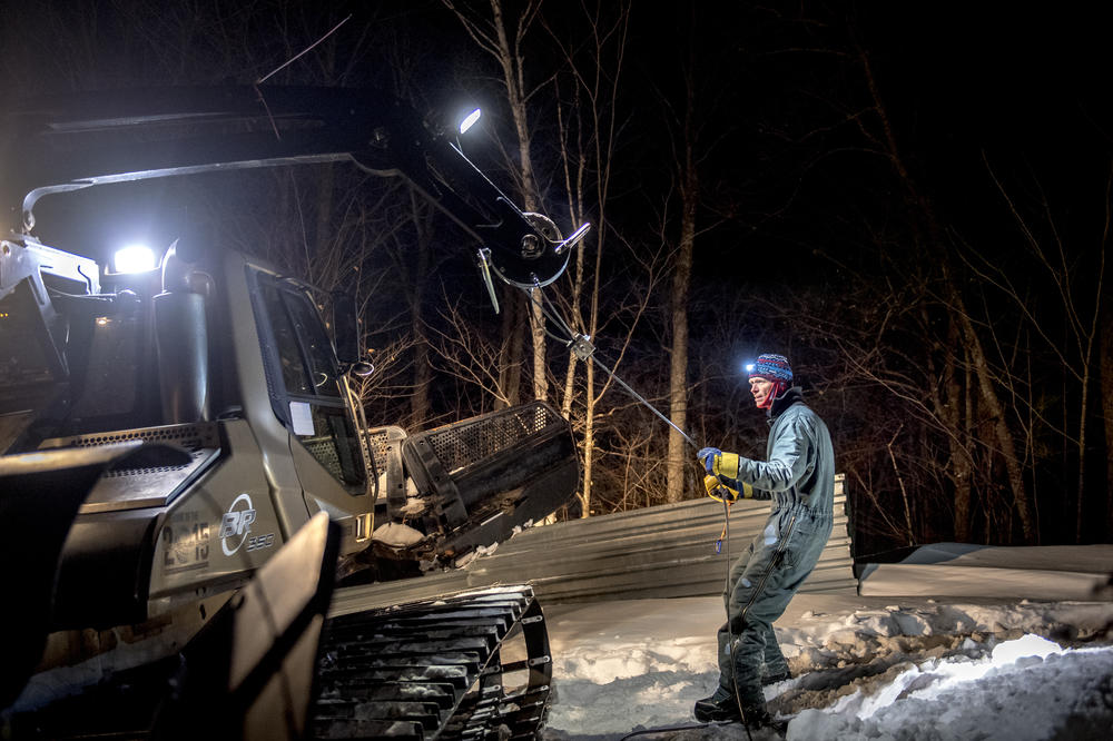 Dick Ziegler works on the ski jumping hill at Suicide Hill Ski Bowl on March 4, 2021.