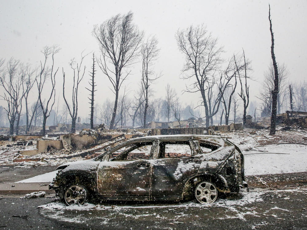 On Dec. 30, 2021, wildfires ignited and tore through Boulder County in Colorado. By the next day, residential streets like this one in Louisville were unrecognizable: houses leveled, cars stripped to bare metal.