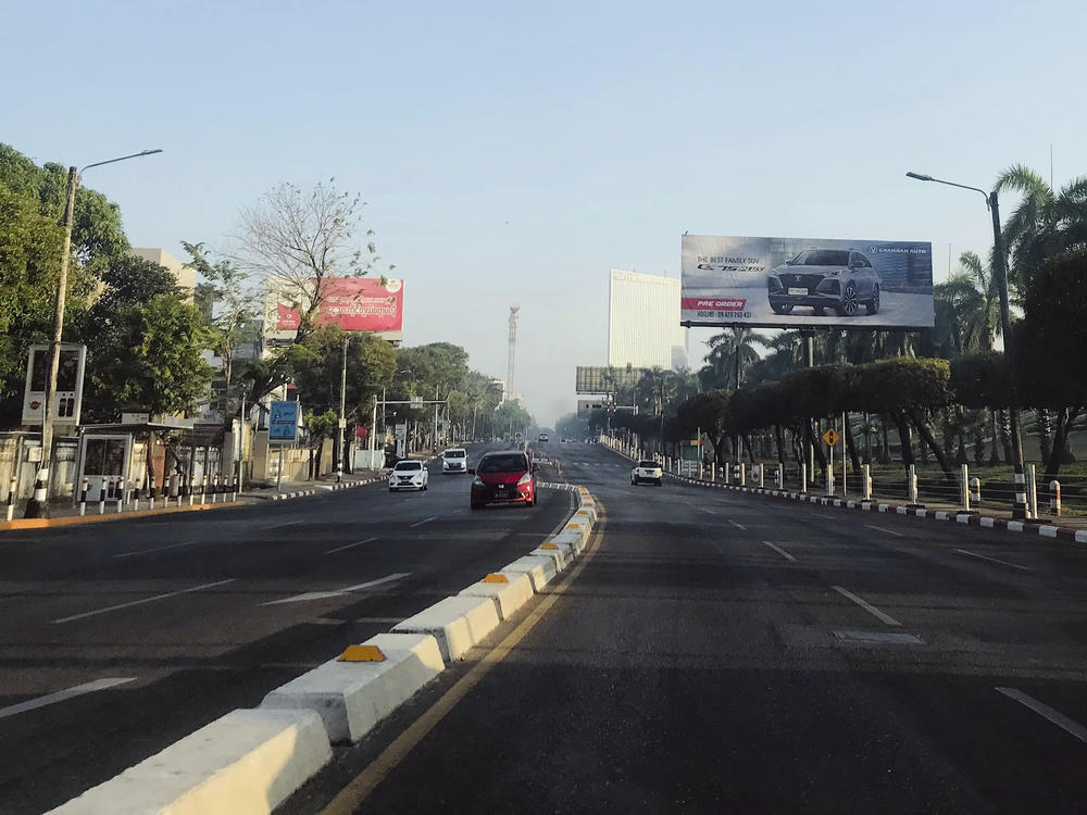 Few vehicles drive along Pyay Road, a main avenue that's usually busy with vehicular traffic, on Tuesday, Feb. 1 in Yangon, Myanmar. Opponents of military rule in Myanmar on Tuesday marked the one-year anniversary of the army's seizure of power with a nationwide strike to show their strength and solidarity.