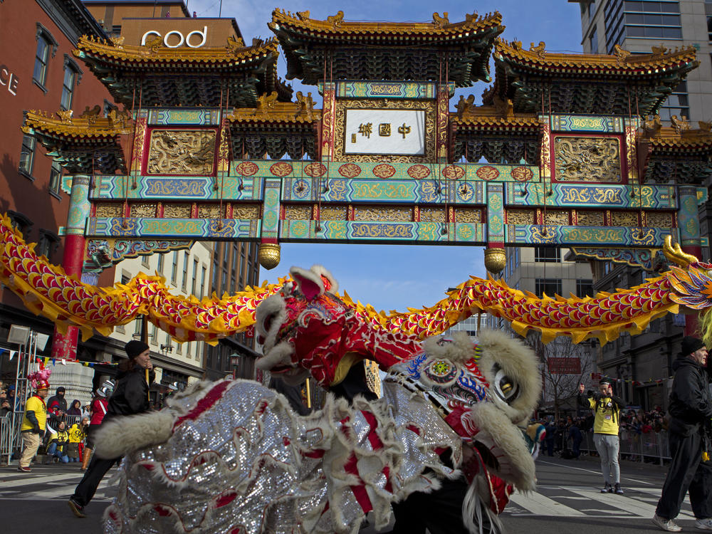 Dancers perform lion and dragon dances during Lunar New Year celebrations in Washington, D.C.'s Chinatown in 2019.