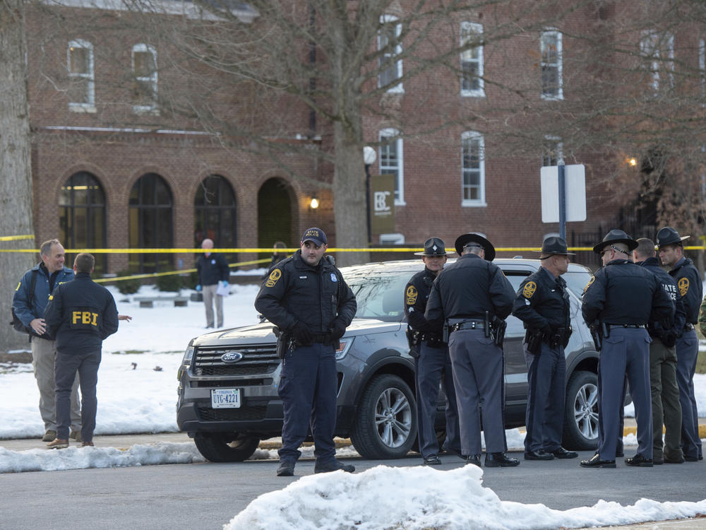 Police conduct an investigation after a shooting at Bridgewater College in Virginia on Tuesday.