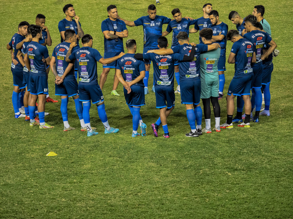 The Salvadoran national team huddles in a circle before practice at the Cuscatlán Stadium in San Salvador, on Tuesday.