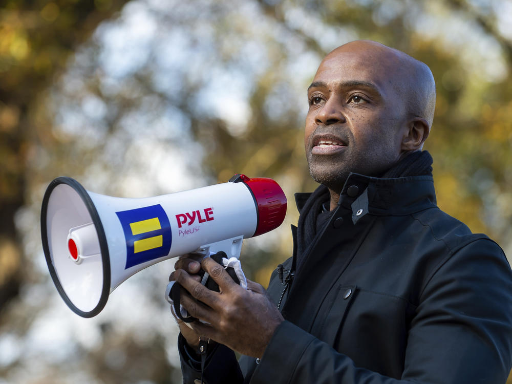 Human Rights Campaign president Alphonso David speaks to supporters on Saturday Dec.19, 2020 during a get-out-the-vote event at a private residence in Dunwoody, Ga. David has filed a lawsuit against the organization in federal court, alleging that he was underpaid and then terminated because he is Black.