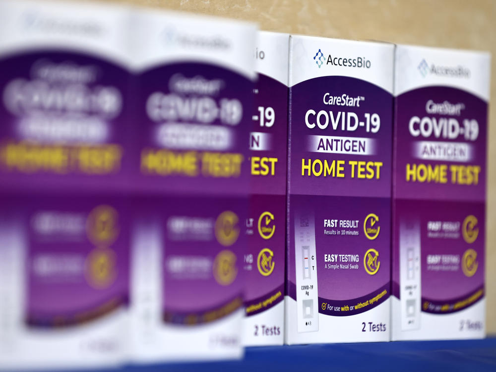 COVID-19 at-home rapid test kits are seen in Los Angeles on Jan. 7.