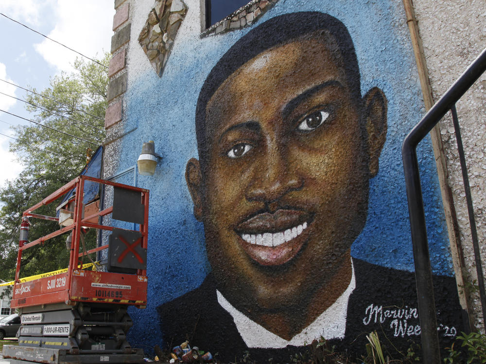 A mural depicting Ahmaud Arbery in seen in Brunswick, Ga., on May 17, 2020.