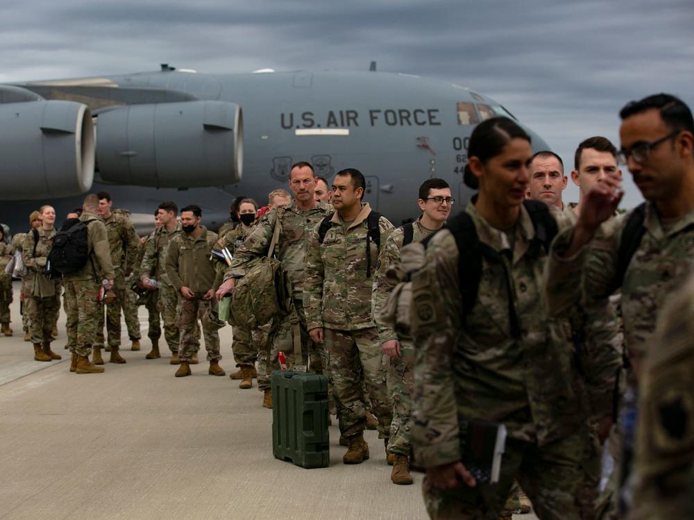 U.S. troops deploy for Europe from Pope Army Airfield at Fort Bragg, N.C., on Feb. 3.