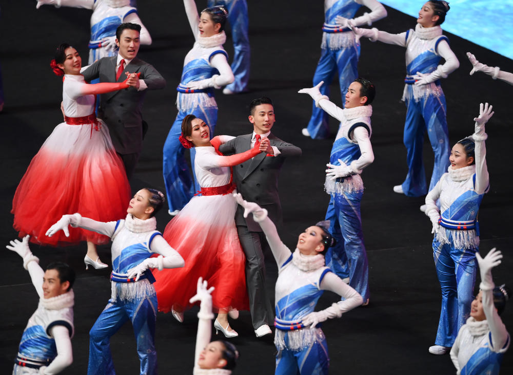 Performers dance during the opening ceremony.