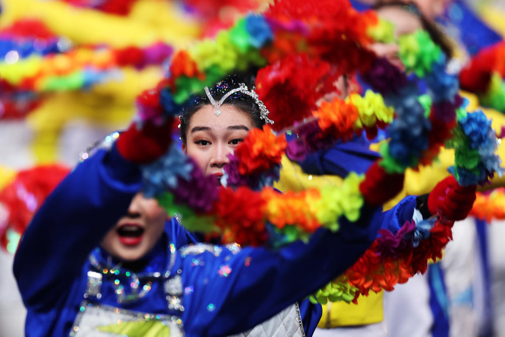 Performers dance during the opening ceremony in Beijing.