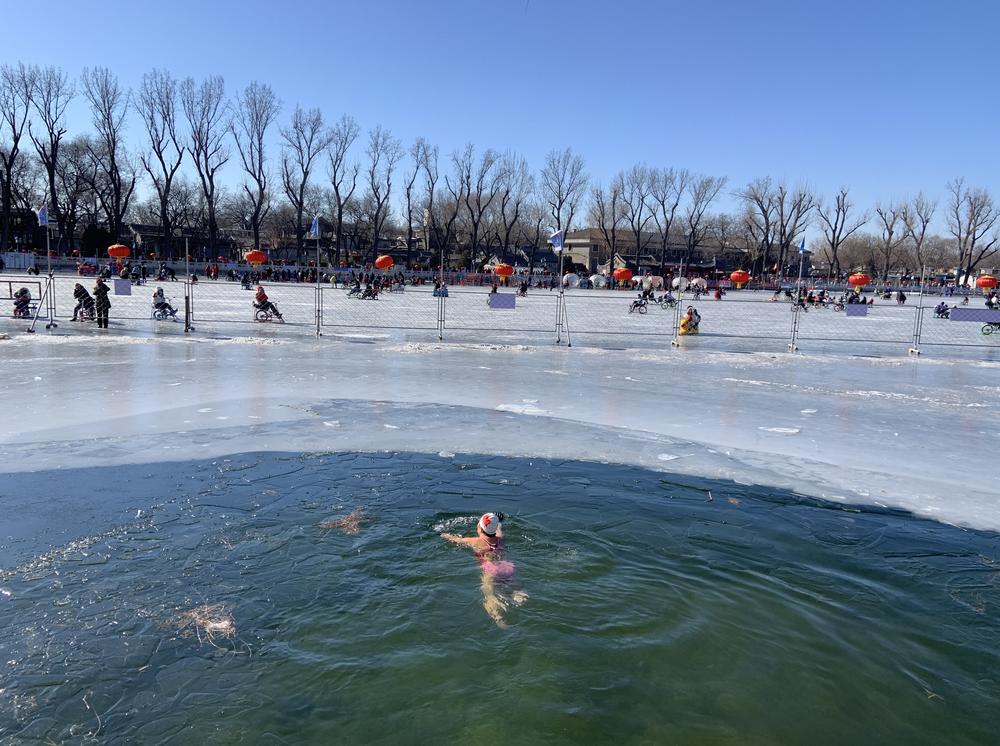 Houhai is a frozen lake used by outdoor skaters — and swimmers. A dip in freezing waters is thought by some in Beijing to prevent colds.