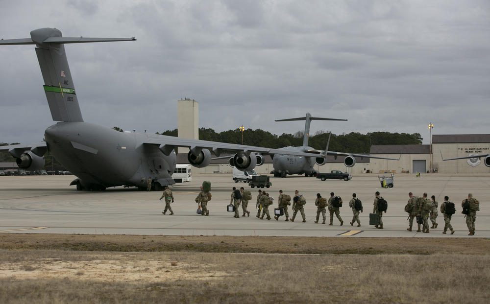 U.S. troops depart Fort Bragg, N.C., Thursday for deployment in Europe as part of the U.S. response to the tensions around Ukraine.