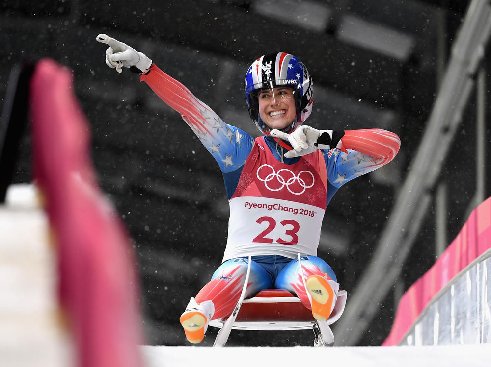 Emily Sweeney of the United States reacts after a training run at the Pyeongchang 2018 Winter Olympics. She would crash in a later race, breaking her neck and back. Her recovery and return to the Olympics has been a long but important mission for her.