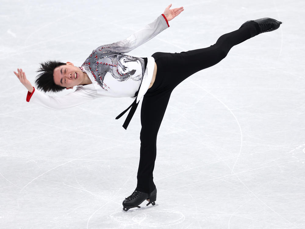 Vincent Zhou won a silver medal in the figure skating team event. But he's been knocked out of the competition for a men's individual medal after twice testing positive for COVID-19.