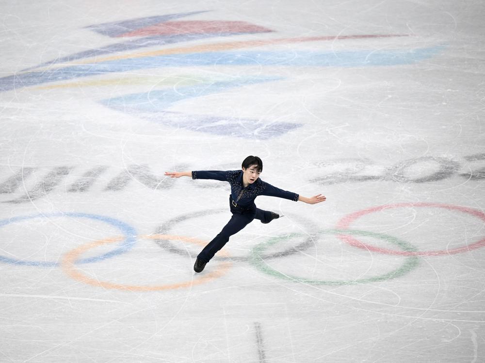 Japan's Yuma Kagiyama competes in the men's single skating short program of the figure skating event during the Beijing 2022 Winter Olympic Games. He came in second place.