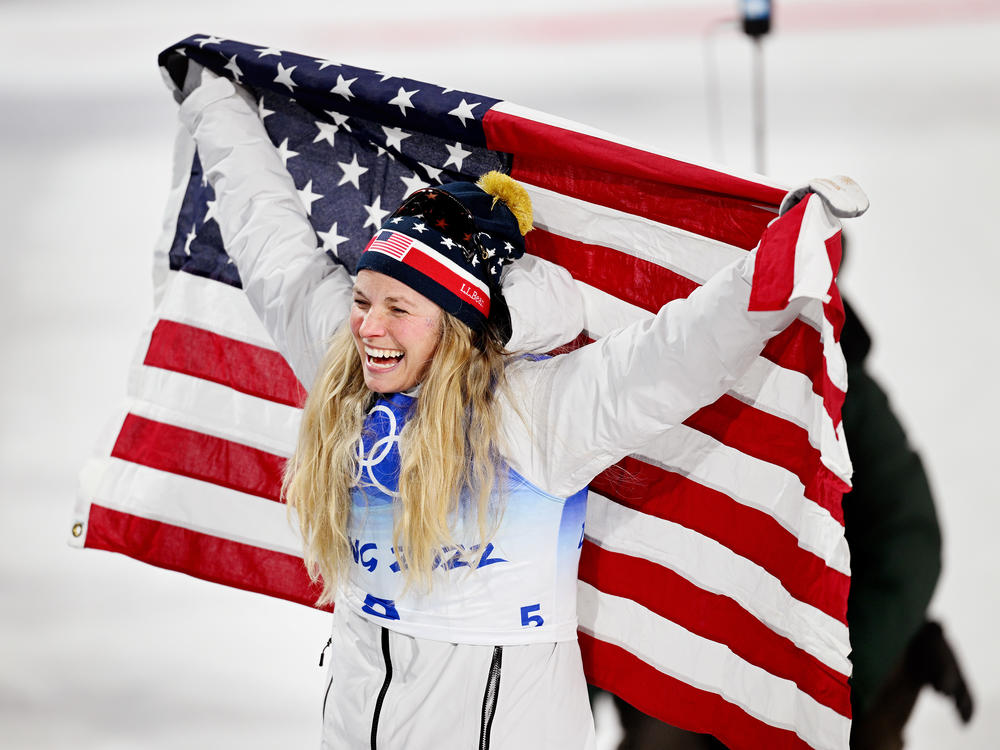 Jessie Diggins of Team USA celebrates after winning the bronze medal in the women's cross-country sprint event on Day 4 of the Beijing 2022 Winter Olympic Games in China.