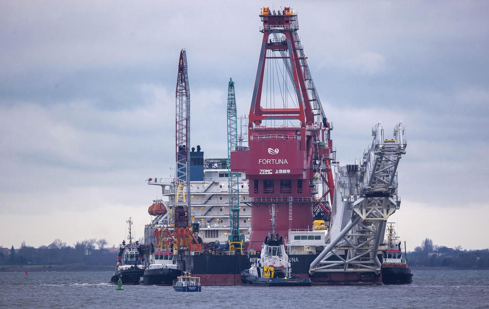 Tugboats get into position on the Russian pipe-laying vessel 