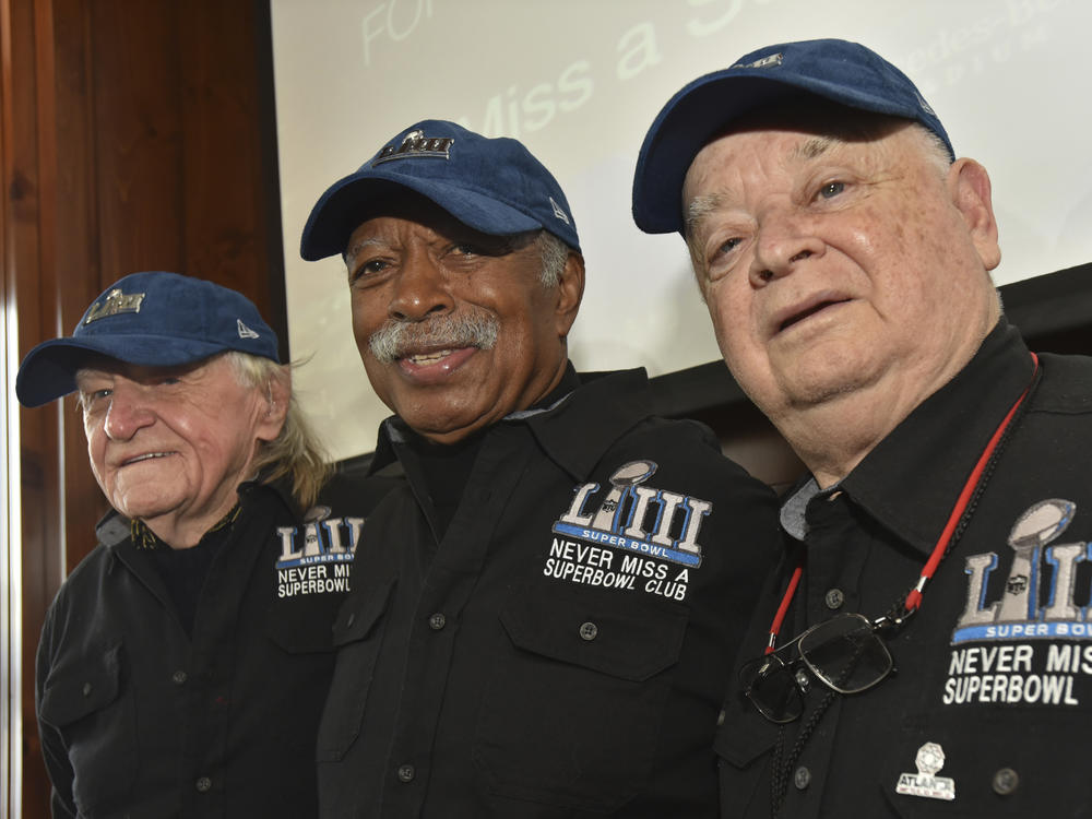 From left, Tom Henschel, Gregory Eaton and Don Crisman have attended every Super Bowl since the first AFL-NFL World Championship 55 years ago. They're meeting at the Super Bowl again this year but future meetings are in question.