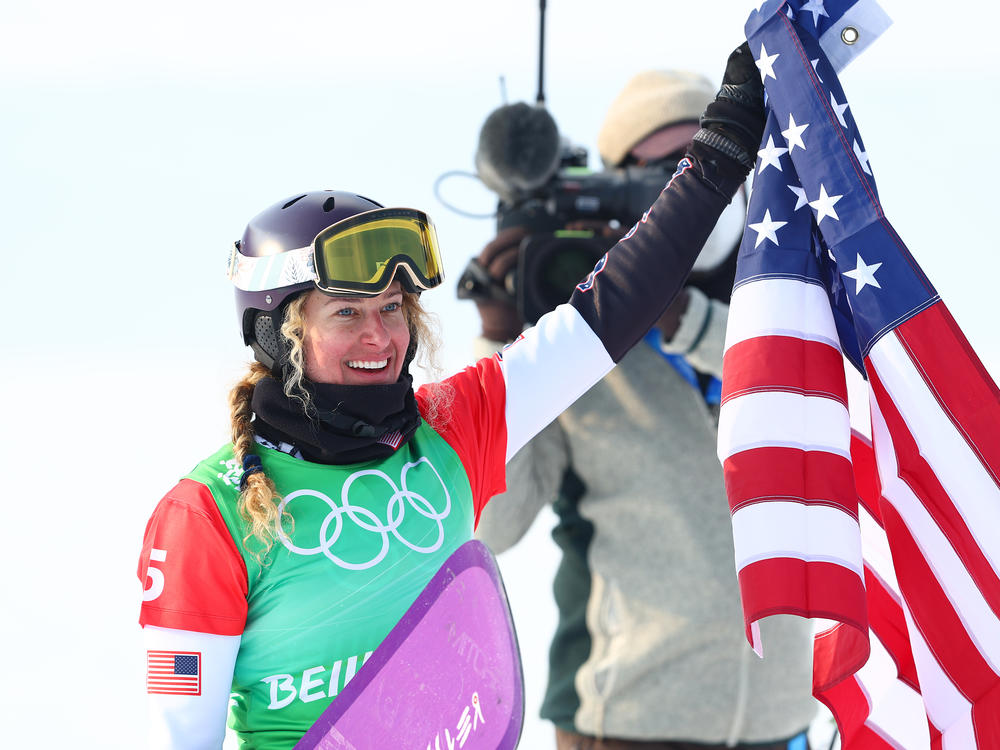 Lindsey Jacobellis wins gold at the women's snowboard cross event at the Beijing Winter Olympics. This is the U.S.'s first gold medal of the Games.
