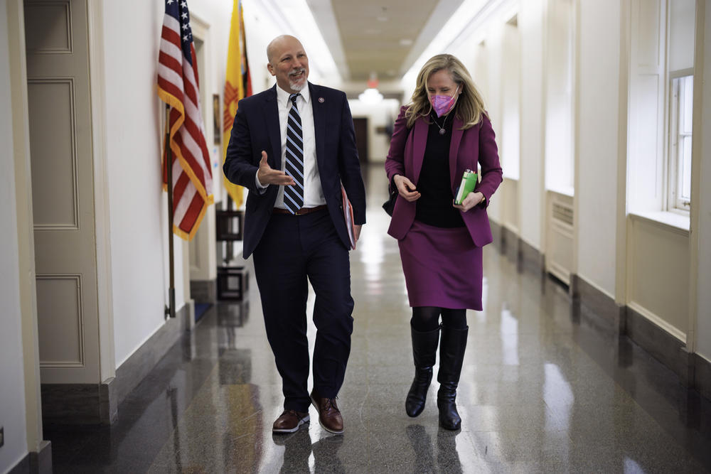 Rep. Roy and Rep. Spanberger chat while walking though the Longworth House office building on Capitol Hill.
