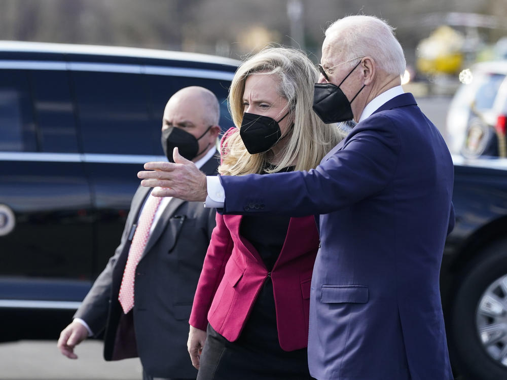 President Biden speaks with Rep. Abigail Spanberger, D-Va., as he arrives on Marine One at Culpeper Regional Airport on Feb. 10.