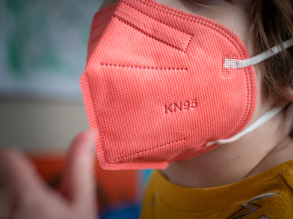 A child wears a KN95 mask for kids in Hastings-on-Hudson, New York.