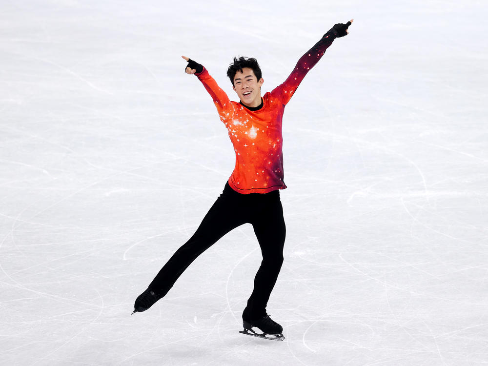 Nathan Chen reacts during his performance in the men's figure skating program in Beijing.