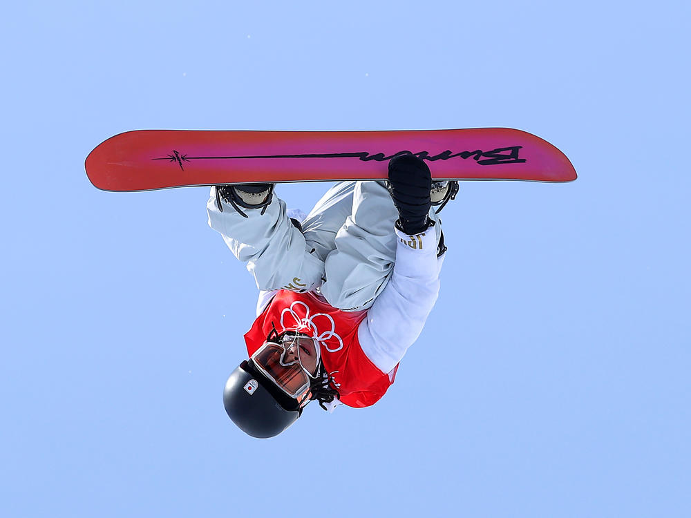 Ayumu Hirano of Team Japan performs a trick in the final gold medal run during the men's snowboard halfpipe final.