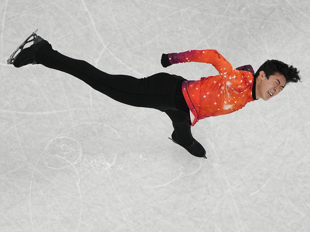 Nathan Chen, of the United States, competes in the men's free skate program during the figure skating event at the 2022 Winter Olympics, Thursday, Feb. 10, 2022, in Beijing.