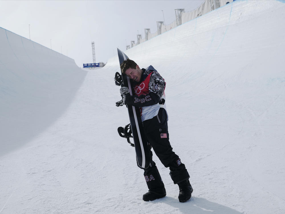 White gets emotional after the men's halfpipe finals at the Beijing Olympics.
