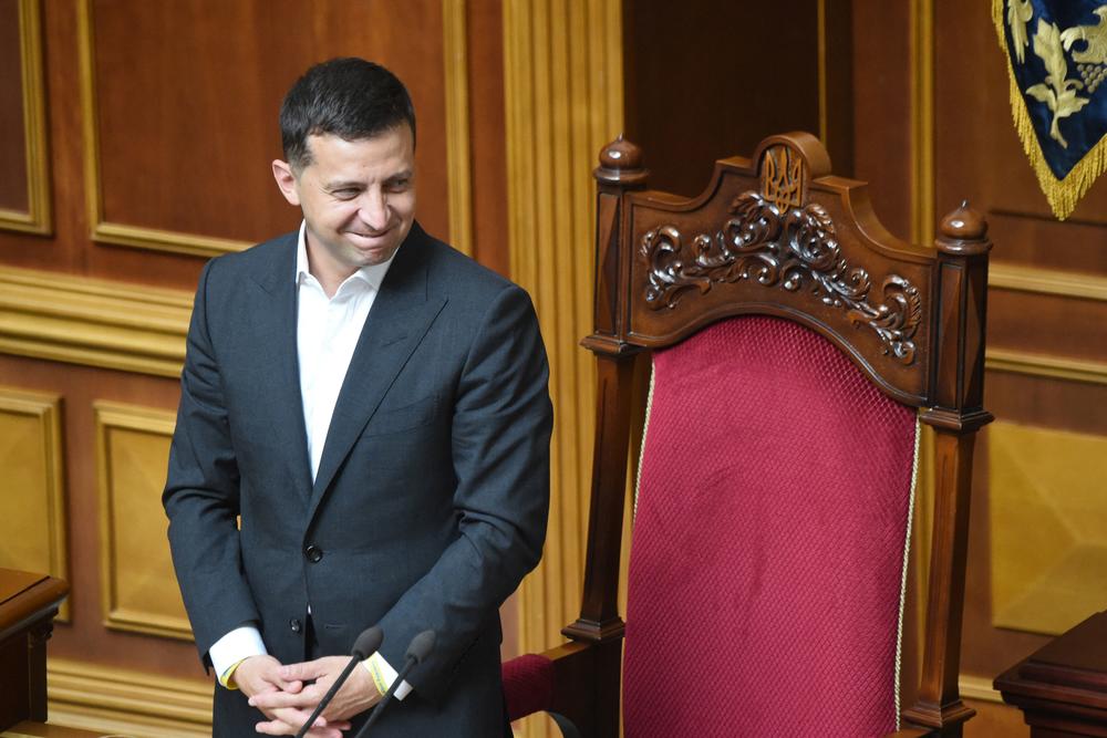 Ukrainian President Volodymyr Zelenskyy greets lawmakers during the solemn opening and first sitting of the new parliament, the Verkhovna Rada, in Kyiv on Aug. 29, 2019.