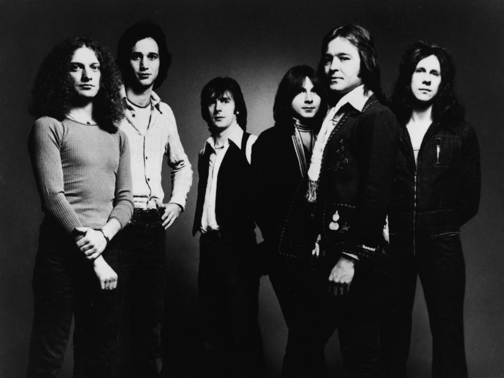 A 1977 promotional image of the band Foreigner. One of the founding members, Ian McDonald, has died at 75.