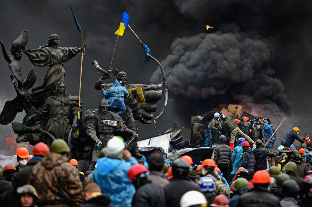 Anti-government protesters continue to clash with police in Independence square, despite a truce agreed between the Ukrainian president and opposition leaders on Feb. 20, 2014, in Kyiv.
