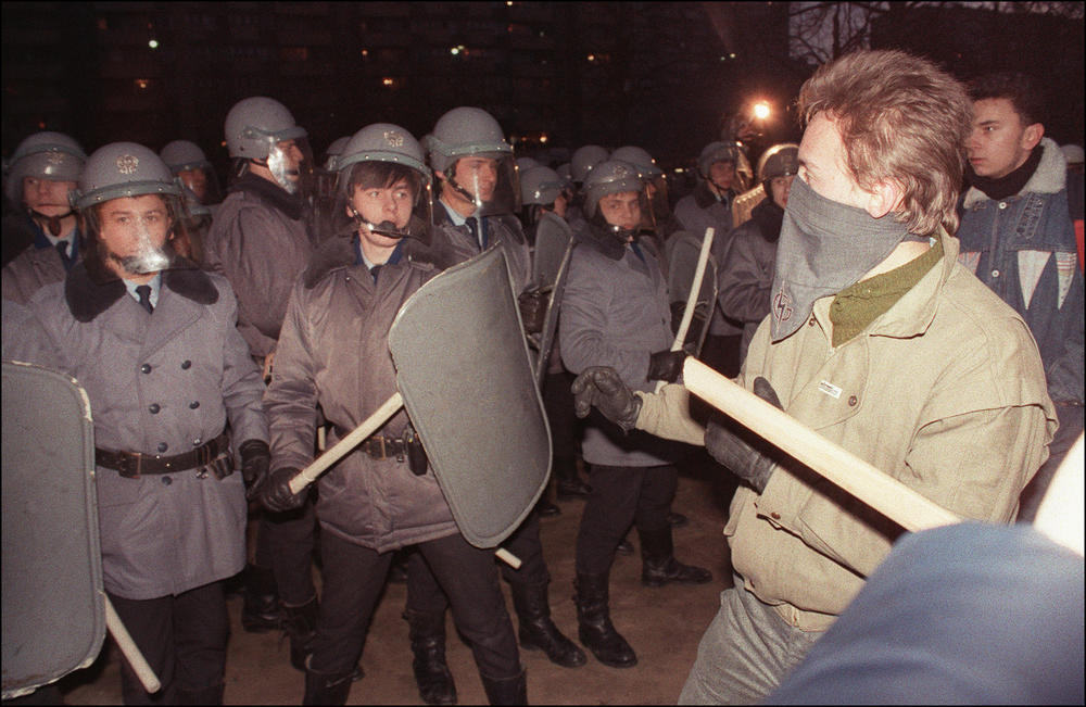 Riot policemen confront radical anti-Communist students on Jan. 27, 1990, in Warsaw in front of Polish United Workers Party (POUP-Communist) headquarters as some 300 youths, mainly activists of the Independent Student Association (NZS) clash with police asking for democracy.
