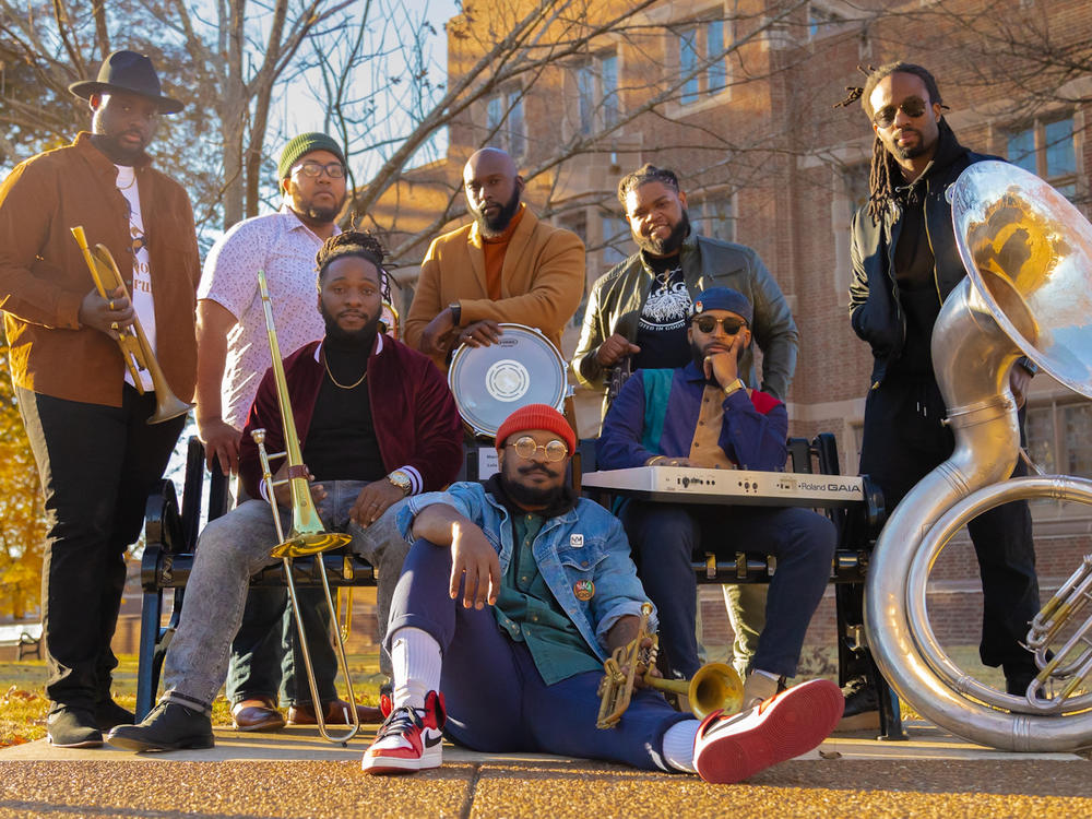 The members of Brassville. From left, back row, standing: Jonathon Neal, MarVelous Brown, Derrick Greene, Adrian Pollard, Nate McDowell; seated on bench: Marcus Chandler and Rashad Sylvester; center, seated on ground: Larry Jenkins, Jr.