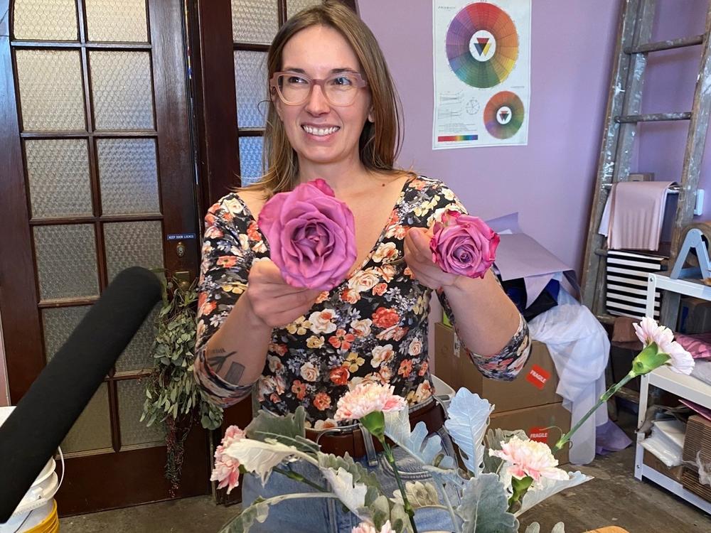 Simmons showcases her newly spun roses, another styling technique used to elevate the flower's appearance.