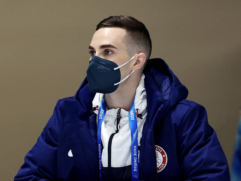 Mariah Bell of Team United States talks with coach and former Olympic figure skater Adam Rippon during a practice session ahead of the Beijing 2022 Winter Olympic Games on Feb. 1, 2022.